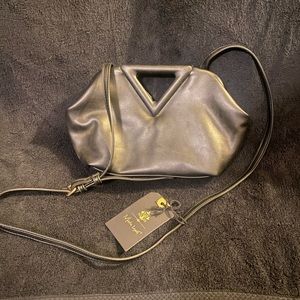 Cute black faux leather purse, never used, brand new